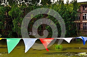 A bunting of colorful burgees flittering in the wind