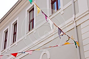 A bunting of colorful burgees flittering in the wind