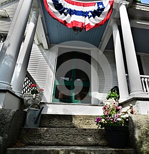 Bunting covered entryways welcome many new US citizens to 4th of July celebrations