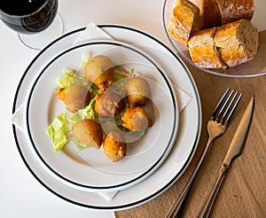 Bunuelos de bacalao - traditional Spanish cod fritters closeup