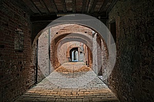 Buonconvento, Siena, Tuscany, Italy : the covered street Via Oscura in the old town photo