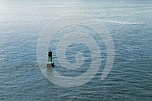 Buoy in Atlantic Ocean surrounded with water