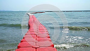 Buoy barrier move on sea is a zone for tourists to swim in designated area. And prohibiting ships from approaching
