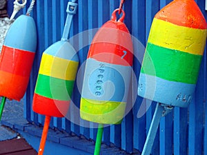 Colorful buoys at the dock photo