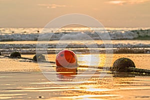 Buoyancy sphere, tied with a rope to use as a barrier for the po