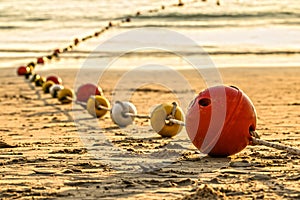 Buoyancy sphere, tied with a rope to use as a barrier for the po