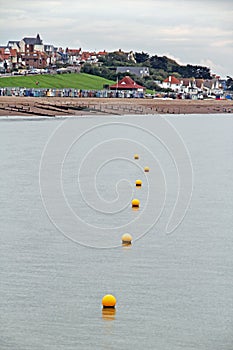 Buoys leading to coast beach