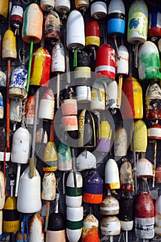 Buoys on the side of a beach shack