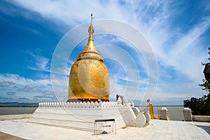 Buphaya Paya Pagoda against blue sky is a golden pagoda located in Bagan in Myanmar near Irrawaddy River