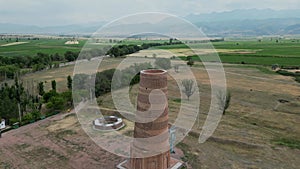 Burana tower, one of the oldest baked brick minarets in Central Asia. Aerial view, Touristic place, Landmark Kyrgyzstan
