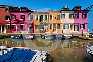 Burano Island in Venice Lagoon Italy - Multi Colored Houses and Canal with Small Boats