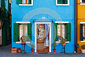 Burano, Venezia, Italy. Details of the windows and doors of the colorful houses in Burano island