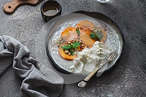 Buratta italian cheese snack served on handmade plate