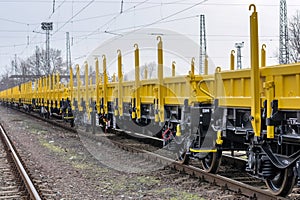 Burgas, Bulgaria - January 27, 2017 - Freight cargo train - 4-axled flat wagon Type:Res Model:072-2 - Transvagon AD