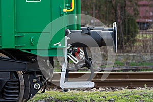 Burgas, Bulgaria - March 20, 2017 - Freight cargo train Buffer- 4axled box wagon green Type:Eanos Model:155-1 - Transvagon AD