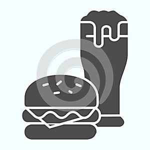 Burger and beer solid icon. Fast-food with drink vector illustration isolated on white. Burger and glass of beer glyph