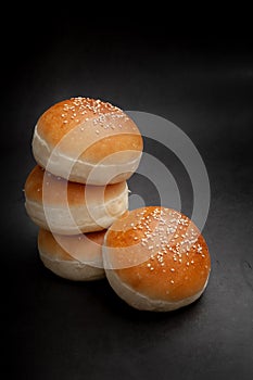 Burger buns with white sesame seeds