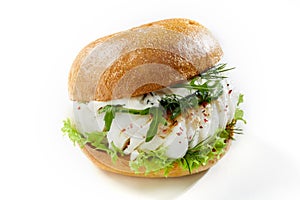 Burger with cod fish against white background