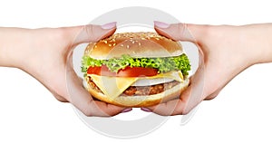 Burger in hand isolated on white background