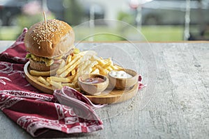 Burger menu in a wooen platter