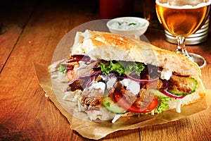 Burger Slice with Grilled Meat Doner and Veggies photo