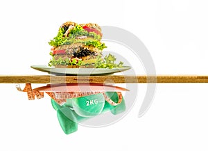 burger vs fitness, dumbbell and measuring tape versus fast food sandwich isolated over white background, healthy