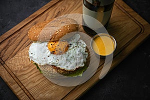 Burgers with cutlet egg and beer