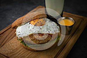 Burgers with cutlet egg and beer