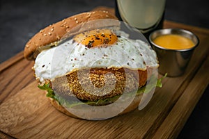 Burgers with cutlet egg and beer