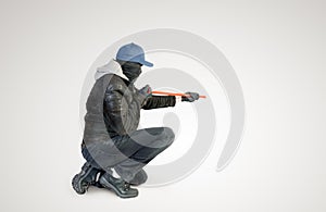 Burglar with crowbar and mask against a white background