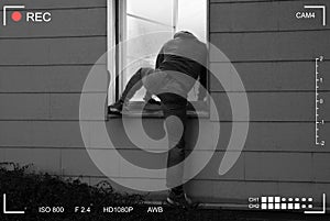 Burglar Entering In A House Through A Window