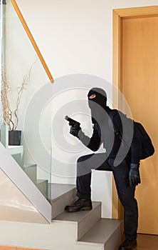 Burglar stealing