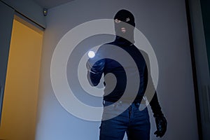 Burglar wearing a balaclava