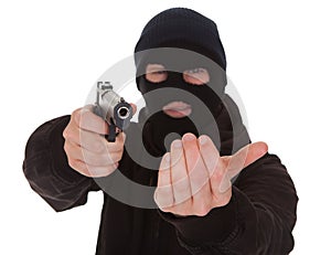 Burglar Wearing Mask Holding Gun