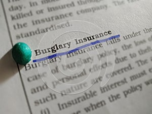 burglary insurance words displaying on book article underlined text pattern