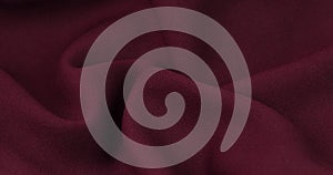 Burgundy fabric background. Burgundy cloth waves background texture.