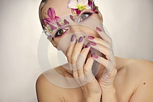 Burgundy red manicure and eye makeup