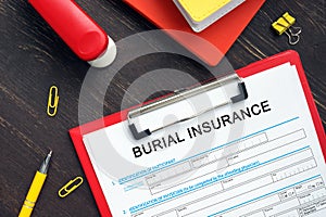 BURIAL INSURANCE Application Form sign on the financial document