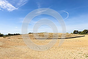 Burial mound of the megalithic monument of El dolmen de Soto, in the village of Trigueros, Huelva province, Andalusia, Spain