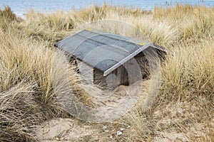 Buried Beach Hut