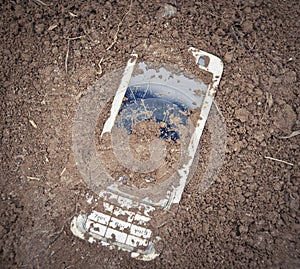 Buried old mobile phone