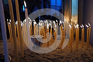 Buring religious candles photo