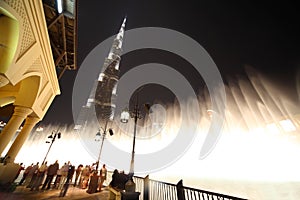 Burj Dubai skyscraper and fountain turned on night