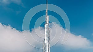 The Burj Khalifa among blue sky with clouds timelapse. Dubai, UAE