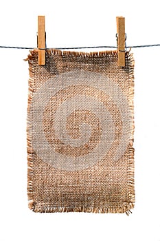Burlap canvas with lacerate edges hanging