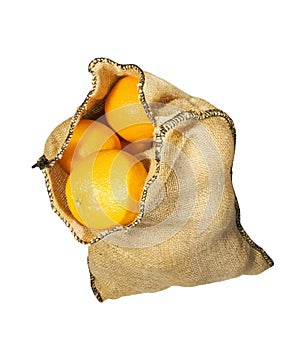 Burlap sack full of oranges isolated