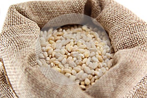 Burlap sack with pearl barley