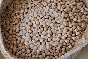 Burlap sack with raw Chickpea or Chia seeds