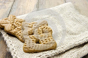 Burlap sack with two Dutch cookies called speculaasjes