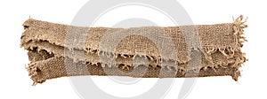 Burlap texture. A piece of torn burlap on a white background. Canvas. Packing material